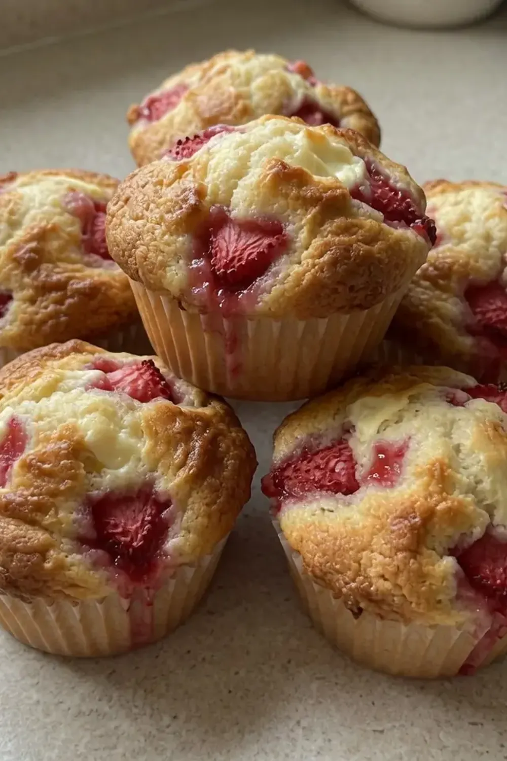 Bakery-Style Strawberry Cream Cheese Muffins
