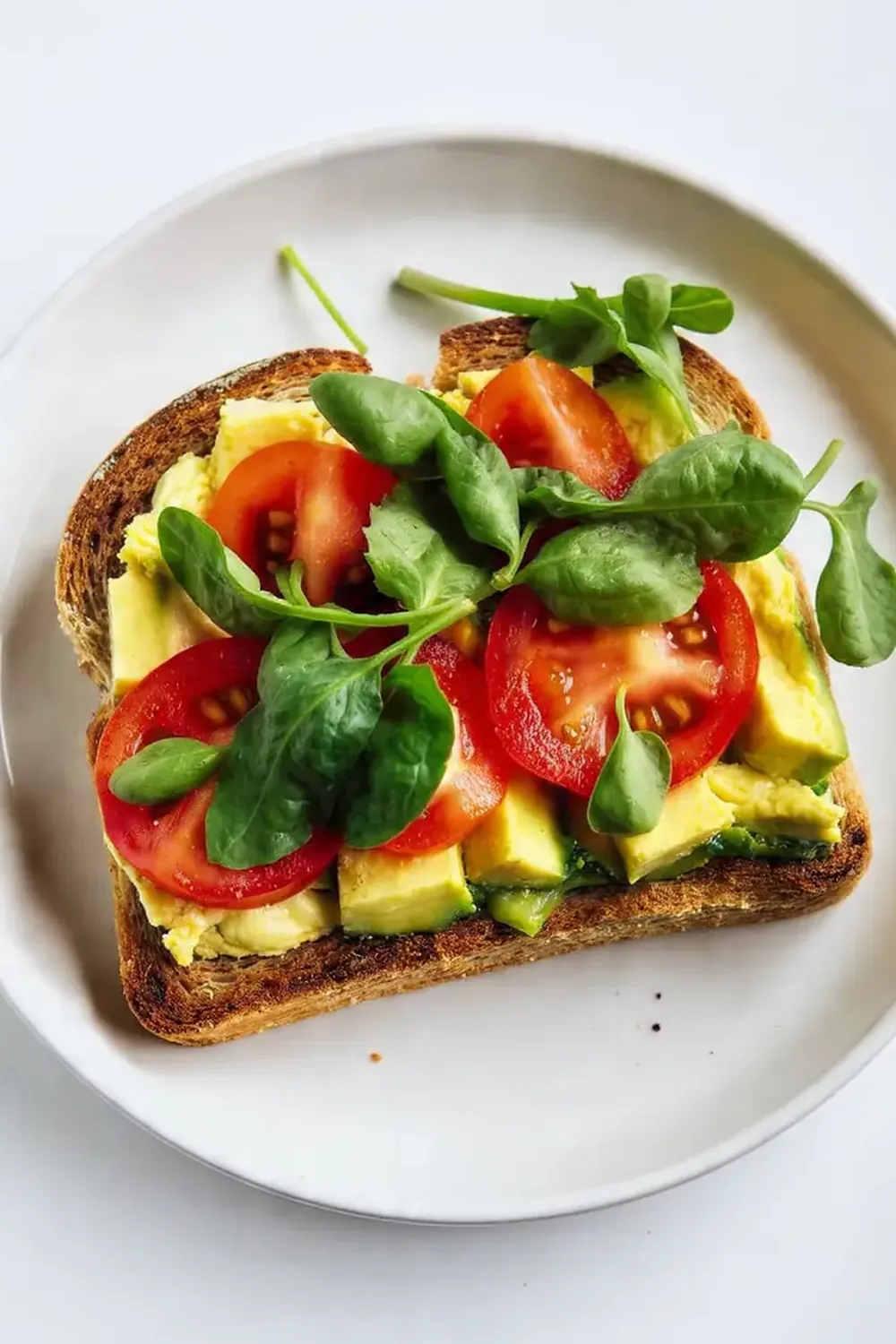 Easy Avocado Toast with Tomatoes and Greens